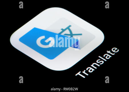 Un gros plan de l'icône de l'application Google Translate, comme on le voit sur l'écran d'un téléphone intelligent (usage éditorial uniquement) Banque D'Images