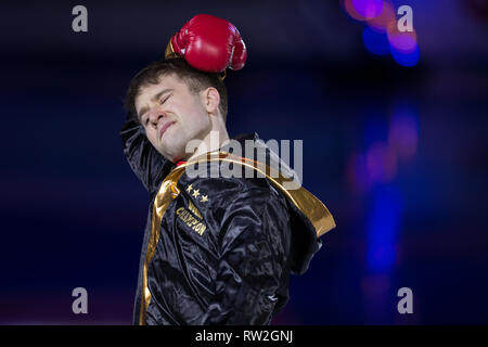 Misha ge d'Ouzbékistan exécute son programme du salon au cours de championnats du monde de patinage artistique 2018 à Milan, Italie Banque D'Images