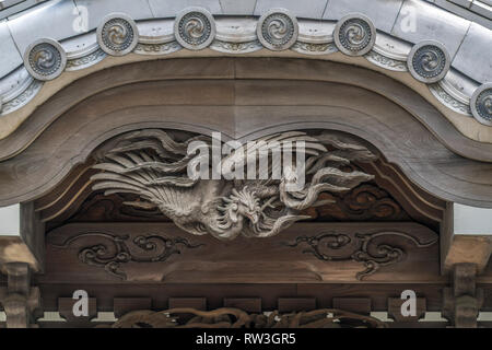 Fushichou Shoshunji bois voulu au Temple. Jodo Shinshu Buddhist Temple situé en face de l'hôtel Park Hyatt à Yoyogi, Shibuya, Tok Banque D'Images