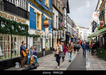 Les amuseurs publics sur une rue du centre-ville de Cork, Cork City, comté. Cork, Irlande Banque D'Images