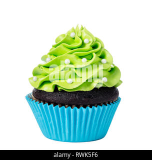 Cupcake chocolat décoré de glaçage vert et saupoudre de l'isolated on white Banque D'Images