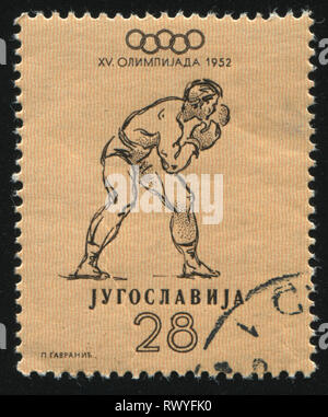 Russie KALININGRAD, 12 novembre 2016 : timbres en Yougoslavie montre, boxeur, vers 1952 Banque D'Images