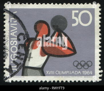 Russie KALININGRAD, 12 novembre 2016 : timbres de Yougoslavie de basket-ball, spectacles, vers 1964 Banque D'Images