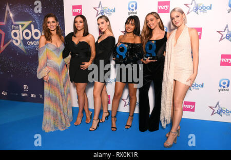 Intangible States Nelson, Perrie Edwards, Leigh-Anne Pinnock, et peu de Thirlwall Jade Mix remporte la meilleure chanson et meilleur prix de groupe, avec Cheryl (à gauche) et Anne-Marie (droite) lors de la remise des prix mondiaux 2019 avec très.co.uk s'est tenue au London's Eventim Apollo Hammersmith. Banque D'Images