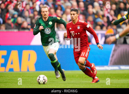 Munich, Allemagne. 09Th Mar, 2019. James RODRIGUEZ, FCB 11 concurrence pour la balle, s'attaquer, duel, l'en-tête, action, lutte contre Maximilian ARNOLD, WOB 27 FC BAYERN MUNICH - VFL WOLFSBURG 6-0 - DFL RÈGLEMENT INTERDIT TOUTE UTILISATION DES PHOTOGRAPHIES comme des séquences d'images et/ou quasi-vidéo - 1.ligue de soccer allemand, Munich, le 09 mars 2019, la saison 2018/2019 journée 25, FCB, München, Crédit : Peter Schatz/Alamy Live News Banque D'Images