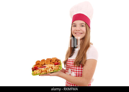 Happy girl cook avec nuggets de poulet sur la plaque Banque D'Images