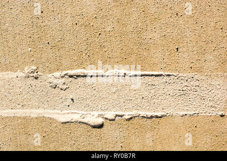 Les traces de pneus des marques de pneus sur le béton comme texture grunge abstrait Banque D'Images