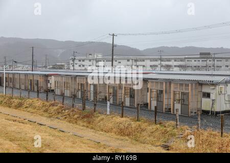 Miyagi. Mar 11, 2019. Photo prise le 11 mars 2019 montre un abri temporaire construite après le séisme et le tsunami de 2011 de la ville d'Ishinomaki dans la préfecture de Miyagi, au Japon. Des cérémonies ont été organisées à travers le Japon le lundi pour marquer le 8e anniversaire d'un puissant tremblement de terre-tsunami déclenché, qui détruit de vastes étendues de la côte nord-est et a déclenché la pire crise nucléaire depuis la catastrophe de Tchernobyl de 1986. Credit : Ma Caoran/Xinhua/Alamy Live News Banque D'Images