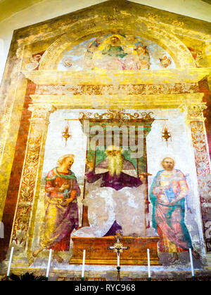 Sant'Antonio Abate tra i Santi Paolo Eremita e Marcello (1508) de Pietro Vannucci connu comme 'il Perugino' (1450 - 1523) - chiesa di San Pietro, Città della Pieve, Pérouse, Italie Banque D'Images