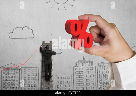 Hand holding red 3D signe pourcentage avec businessman dimensions tableau de tendance sur doodles wall background Banque D'Images