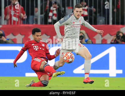 Munich, Allemagne. Mar 13, 2019. Le centre de Liverpool, Andrew Robertson (R) rivalise avec le Bayern Munich's Serge Gnabry lors de la Ligue des Champions, 1/8 de finale deuxième match aller entre le Bayern Munich et Liverpool de l'Allemagne de l'Angleterre à Munich, Allemagne, le 13 mars 2019. Liverpool a gagné 3-1 et d'avancé pour les quarts. Crédit : Philippe Ruiz/Xinhua/Alamy Live News Banque D'Images