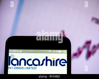 Logo Holdings Lancashire vu affichée sur téléphone intelligent. Banque D'Images