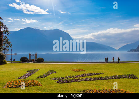 Lugano, Suisse - 10 mars 2019 : Belle vue pittoresque sur le lac de Lugano et les Alpes Suisses Banque D'Images