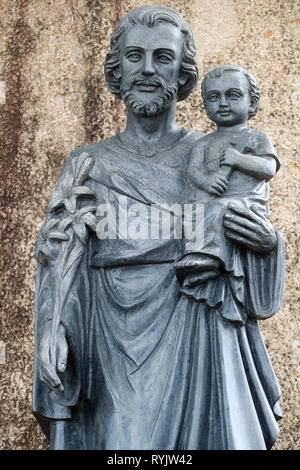 Saint Joseph et l'enfant Christ. Statue. Notre annuaire d'entreprises. Le Vietnam. Banque D'Images