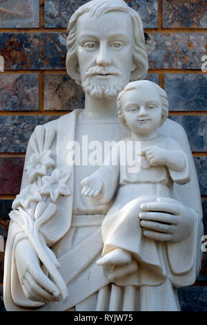 Saint Joseph et l'enfant Christ. Statue. Ha Tien. Le Vietnam. Banque D'Images