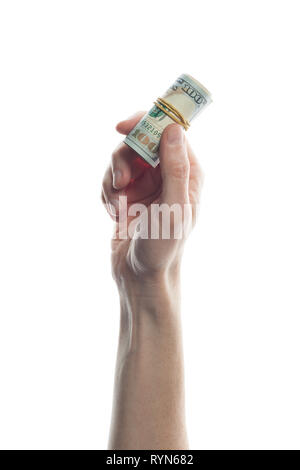 Man hand holding 100 Dollar bills isolé sur blanc. Rouleau de US Dollars ban knote Banque D'Images