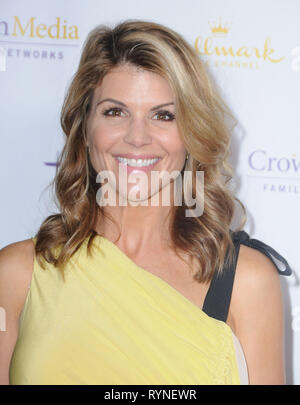 SAN MARINO, CA - le 11 janvier : L'actrice Lori Loughlin arrive à la marque Hallmark Channel & Movie Channel 2014 Winter TCA Party le 11 janvier 2014 à la bibliothèque Huntington et jardins à San Marino, en Californie. Photo de Barry King/Alamy Stock Photo Banque D'Images