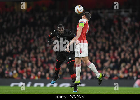 14 MARS 2019 , l'Emirates Stadium, Londres, Angleterre ; Europa League, ronde de 16, deuxième manche, Arsenal vs Rennes ; Laurent Koscielny) (06) d'Arsenal est à la tête de la ball Crédit : Phil Westlake/News Images Banque D'Images