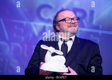 Laupheim, Allemagne. Mar 15, 2019. Stefan Arndt, producteur de cinéma, est enchanté de la producteur Carl Laemmle Award. Laupheim est la maison de Carl Laemmle fondateur d'Hollywood. Pour son 150e anniversaire, le prix a été créé. Credit : Fabian Sommer/dpa/Alamy Live News Banque D'Images