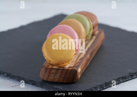 Petit-déjeuner de l'éclisse de bois macarons Banque D'Images