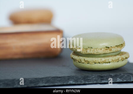 Petit-déjeuner de l'éclisse de bois macarons Banque D'Images