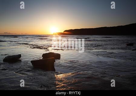 La baie de Kimmeridge au coucher du soleil de la côte jurassique Dorset England UK Banque D'Images