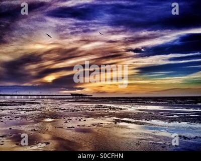 Coucher de soleil sur la jetée de Southport Banque D'Images