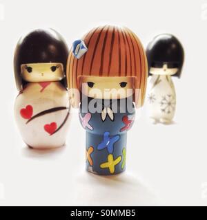 Poupées de Kokeshi stylisé japonais Banque D'Images