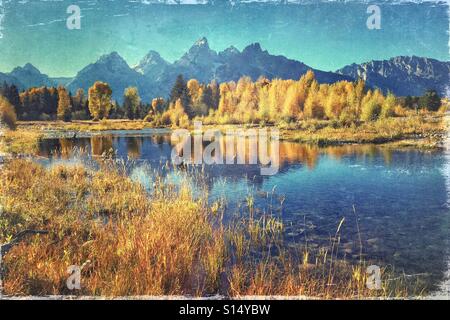 Vintage Traitement des couleurs de l'automne et le Grand Tetons le long de la rivière Snake à Grand Teton National Park, Wyoming, USA. Banque D'Images