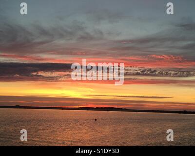 Coucher de soleil sur l'Île Hilbre, Wirral Banque D'Images