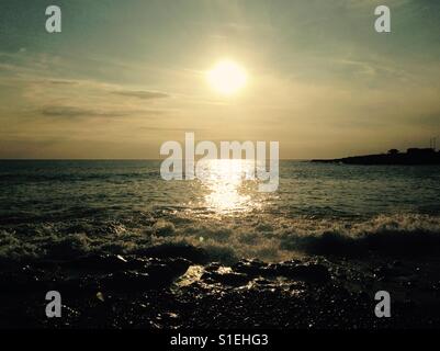 Sunset Beach en Rest Bay South Wales Porthcawl Banque D'Images