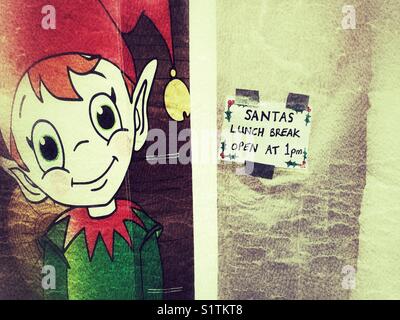 Santa's pause déjeuner, signe sur porte fermée de Santa's Grotto Banque D'Images
