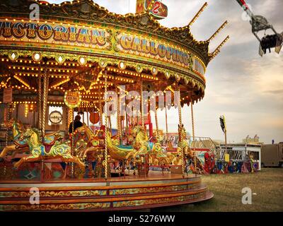 Au carrousel de foire voyage Hoppings Newcastle Banque D'Images