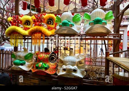 Têtes de Lion sur l'affiche pour le Nouvel An chinois Banque D'Images