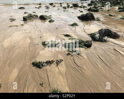 Marée basse sur la plage de Sandy Welsh Banque D'Images