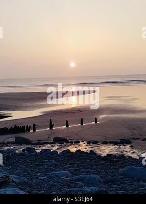 Coucher de soleil sur la mer à Westward Ho ! Banque D'Images