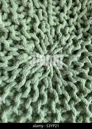 Gros plan sur un tissu tricoté vert Banque D'Images