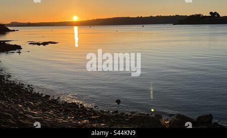 Lever du soleil sur Firestone Bay, Plymouth, Royaume-Uni Banque D'Images