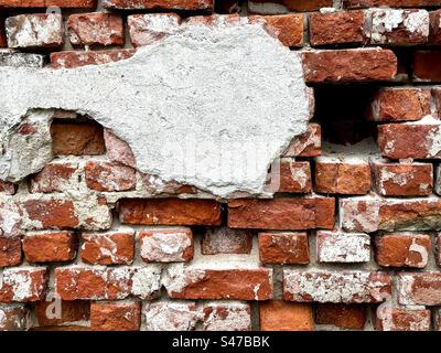 Mur de briques endommagées Banque D'Images