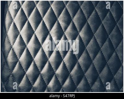 Housse de siège à motif losange éclairé latéralement Banque D'Images