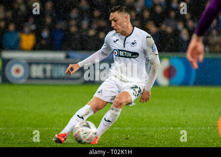 Swansea, Royaume-Uni. 16 mars 2019. Connor Roberts de Swansea City en action contre Manchester City. L'unis en FA Cup, quart de finale cette image ne peut être utilisé qu'à des fins rédactionnelles. Usage éditorial uniquement, licence requise pour un usage commercial. Aucune utilisation de pari, de jeux ou d'un seul club/ligue/dvd publications. Photos par Andrew Orchard la photographie de sport/Alamy live news Banque D'Images