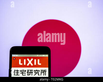 L'Ukraine. Mar 16, 2019. Lixil Group Corporation vu le logo affiché sur un téléphone intelligent. Crédit : Igor Golovniov SOPA/Images/ZUMA/Alamy Fil Live News Banque D'Images