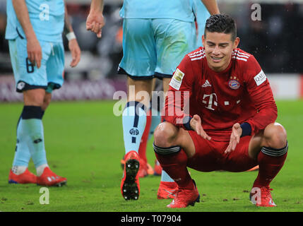 Munich, Allemagne. Mar 17, 2019. Le Bayern Munich's James Rodriguez réagit au cours d'un match de Bundesliga allemande entre le Bayern Munich et de Mayence à Munich, Allemagne, le 17 mars 2019. Crédit : Philippe Ruiz/Xinhua/Alamy Live News Banque D'Images