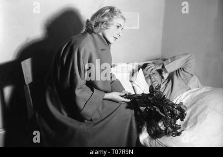 Les gens, la société, des règles de politesse, la visite d'une personne malade, scène, 1950 Additional-Rights Clearance-Info-Not-Available- Banque D'Images