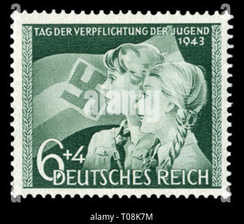 Historique allemand stamp : Jeune garçon et fille sur le fond de l'indicateur de Nazi. Le jour de l'engagement des jeunes dans les unités Deutsches jungvolk Banque D'Images