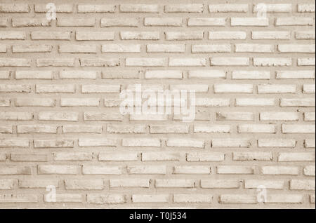 Crème et blanc mur texture background. La maçonnerie en pierre ou parquet ancien modèle rock intérieur béton clair profil briques inégales stac design Banque D'Images