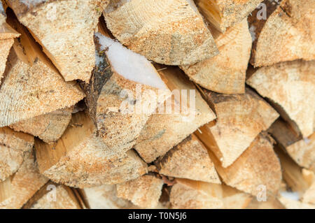 Bois de chauffage couverte de neige Banque D'Images