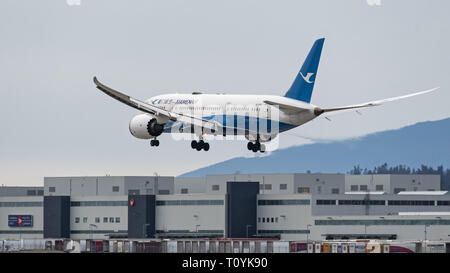 Richmond, Colombie-Britannique, Canada. Mar 16, 2019. Un XiamenAir (Xiamen Airlines) Boeing 787-8 Dreamliner (B-2762) de large-corps jetliner atterrit à l'Aéroport International de Vancouver. Credit : Bayne Stanley/ZUMA/Alamy Fil Live News Banque D'Images