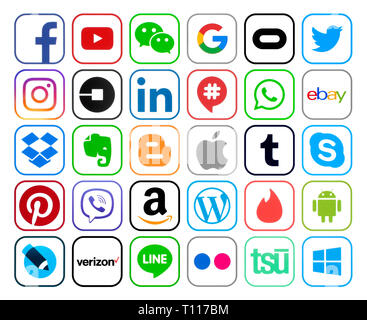 Kiev, Ukraine - 11 décembre 2018 : Collection d'icônes de médias sociaux populaires couleur avec rim, imprimée sur du papier : Facebook, Twitter, Instagram, Pinterest Banque D'Images