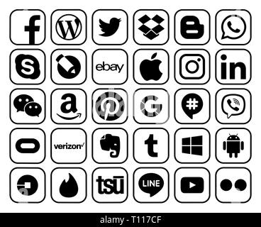 Kiev, Ukraine - 11 décembre 2018 : Collection d'icônes de médias sociaux les plus populaires avec rim noir, imprimé sur du papier : Facebook, Twitter, Instagram, Pinterest Banque D'Images